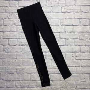 Koral Leggings in Black With Gold Mesh Detailing